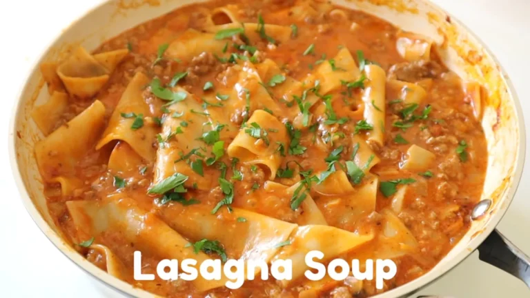 Easy Lasagna Soup Recipe 10 Hearty lasagna soup in a bowl topped with ricotta, melted mozzarella, and fresh basil