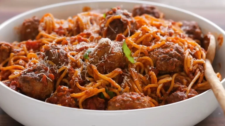Soft & Juicy Ricotta Meatballs Recipe 8 Juicy ricotta meatballs in tomato sauce garnished with basil