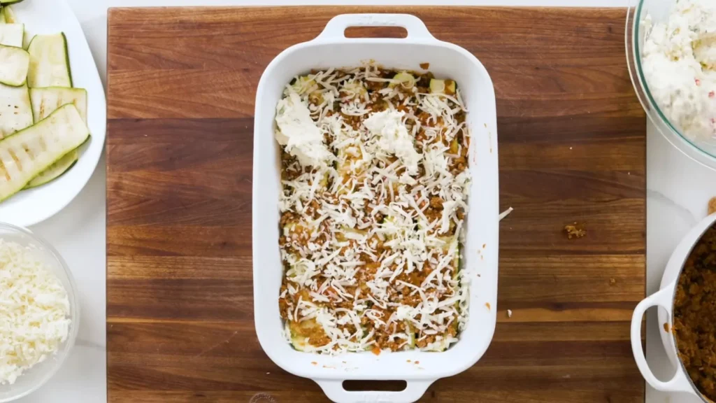 Easy Zucchini Lasagna Recipe 2 Layering zucchini and ricotta in a lasagna dish