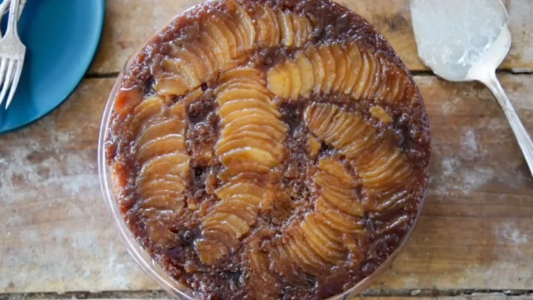 Warm & Cozy Spiced Pear Upside Down Cake Recipe 6 Golden Spiced Pear Upside Down Cake topped with caramelized pear slices