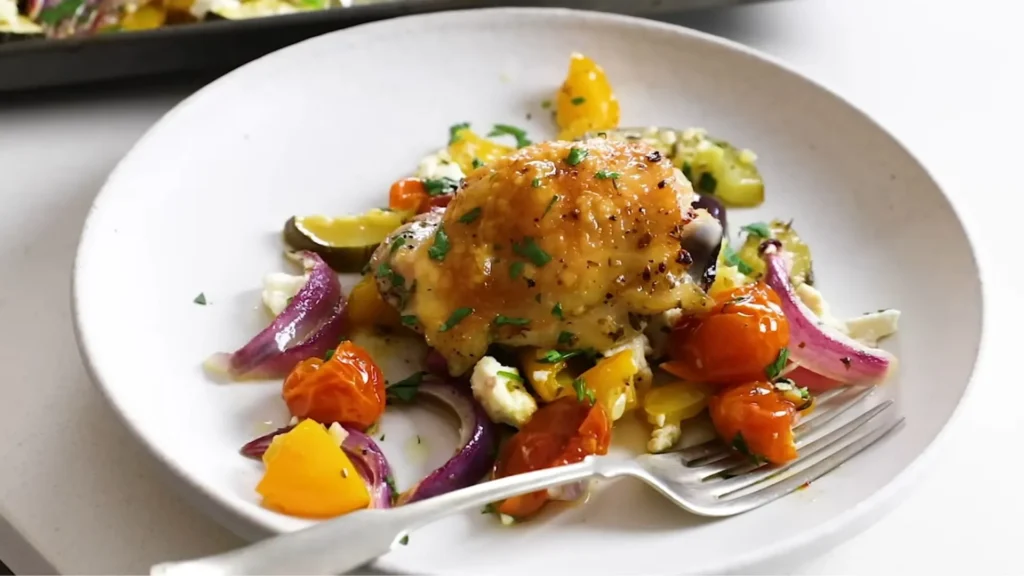 Sheet Pan Greek Chicken & Veggies (Easy One-Pan Meal) 3 Greek chicken served with tzatziki and pita