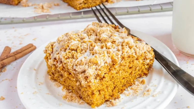 Pumpkin Coffee Cake Recipe (Moist & Cozy for Fall) 10 Moist pumpkin coffee cake slice with cinnamon crumb