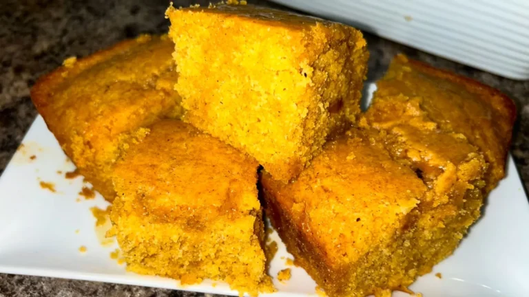 Sweet Potato Cornbread Recipe 10 Moist sweet potato cornbread slice with melting butter.