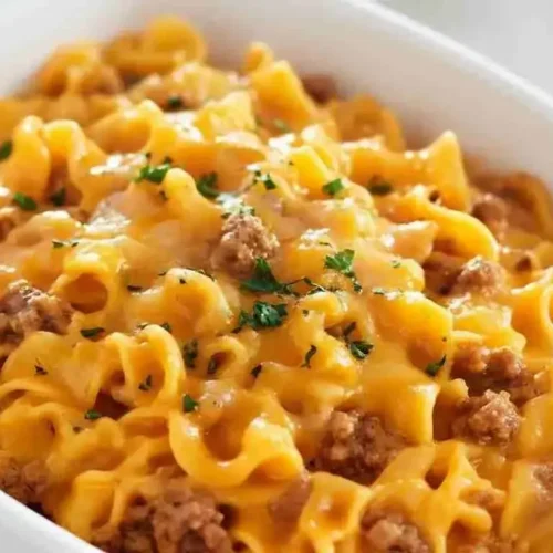 Cheesy Beef and Noodle Casserole with Crispy French Onions 3 Cheesy beef and noodle casserole topped with crispy French fried onions.
