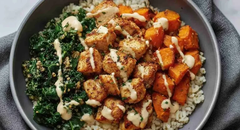 Healthy Chicken & Sweet Potato Rice Bowl 9 Healthy chicken and sweet potato rice bowl served with creamy dressing.