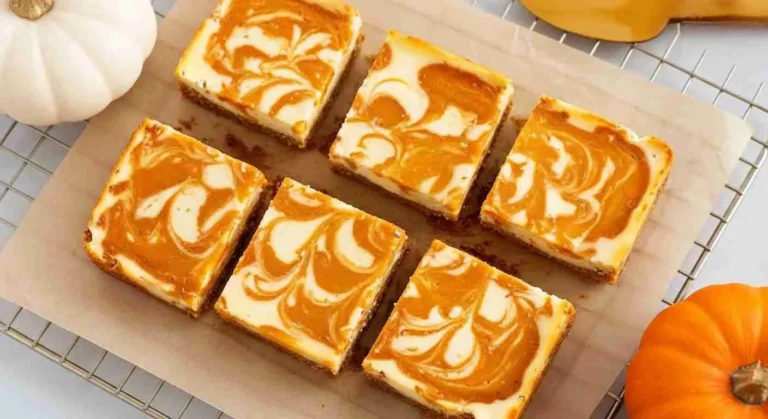 Easy Pumpkin Spice Cheesecake Bars Recipe 6 Pumpkin Spice Cheesecake Bars with graham crust and swirled top