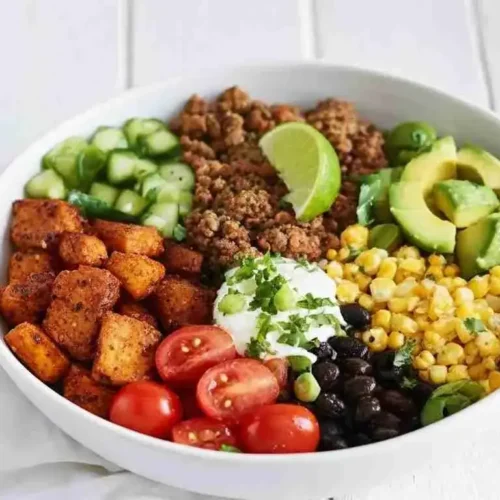 Sweet Potato Taco Bowl Recipe 3 Healthy Sweet Potato Taco Bowl with black beans, corn, avocado, and lime dressing.
