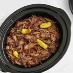 Tender crockpot Mississippi pot roast with gravy and pepperoncini peppers