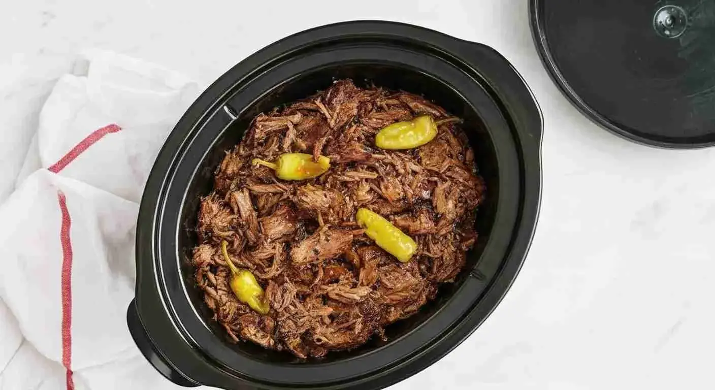 Crockpot Mississippi Pot Roast 1 Tender crockpot Mississippi pot roast with gravy and pepperoncini peppers