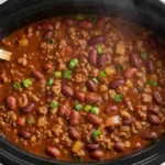 Hearty Crockpot Tex-Mex chili dish served in a bowl with toppings