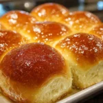golden homemade buttery dinner rolls fresh from oven
