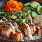 spicy salmon rice bowl with creamy sesame mayo sauce