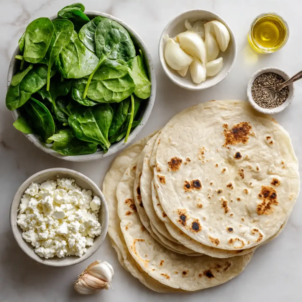 Ingredients for Spinach and Feta Quesadillas including fresh spinach and feta