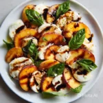 peach caprese salad with fresh peaches mozzarella basil and balsamic glaze